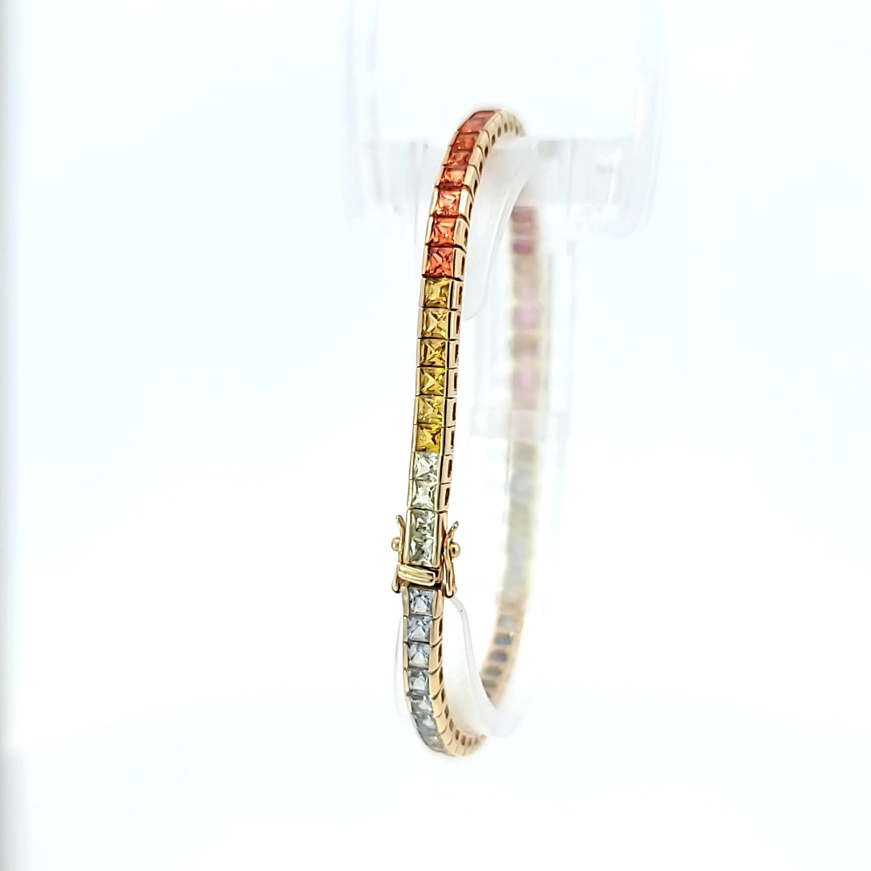 10 kt Yellow gold rainbow Sapphire bracelet