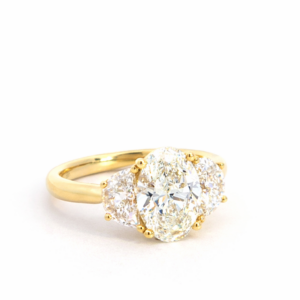 Oval Cut Lab Grown Diamond with Half Moon Sides Ring
